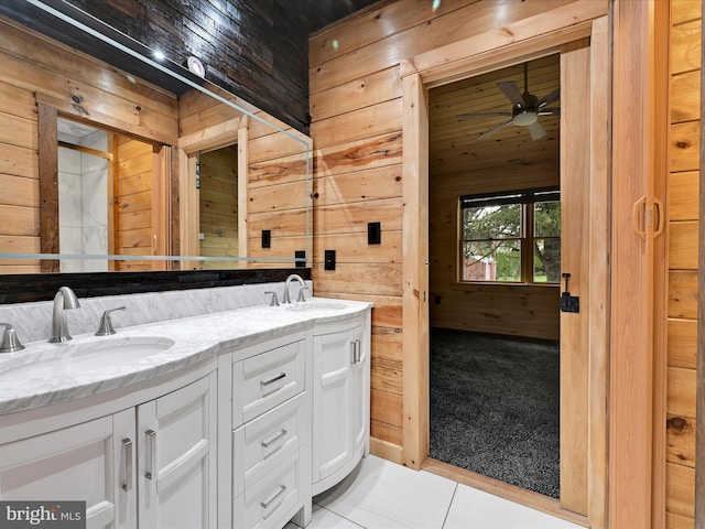 1918 Friedensburg Rd, Reading, PA 19606 - bathroom with wood walls, a sink, and ceiling fan