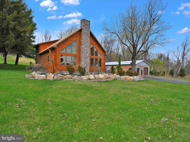 1918 Friedensburg Rd, Reading, PA 19606 - view of property exterior with a lawn, a chimney, and log siding