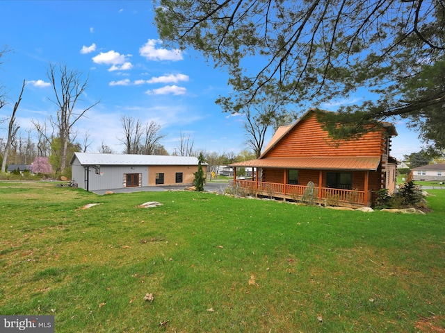1918 Friedensburg Rd, Reading, PA 19606 - back of property with a lawn and a porch