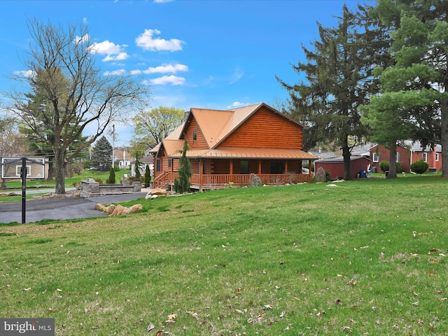1918 Friedensburg Rd, Reading, PA 19606 - view of side of property featuring driveway, log exterior, covered porch, and a yard
