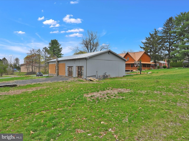 1918 Friedensburg Rd, Reading, PA 19606 - view of side of property featuring a lawn, an outdoor structure, and a pole building