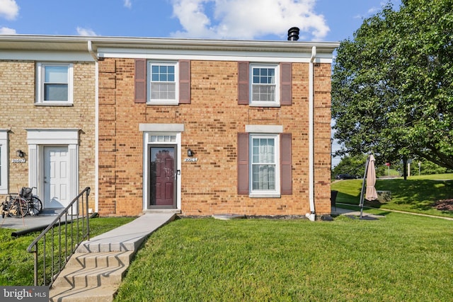 9060 Moonshine Holw Unit G, Laurel, MD 20723 - view of property featuring a front lawn and brick siding