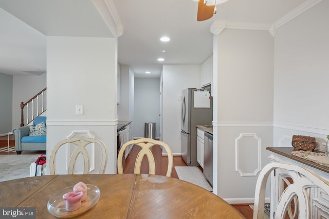 9060 Moonshine Holw Unit G, Laurel, MD 20723 - dining area featuring recessed lighting, stairway, crown molding, wood finished floors, and ceiling fan