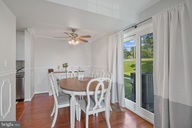 9060 Moonshine Holw Unit G, Laurel, MD 20723 - dining area with dark wood-type flooring, ceiling fan, and a wainscoted wall