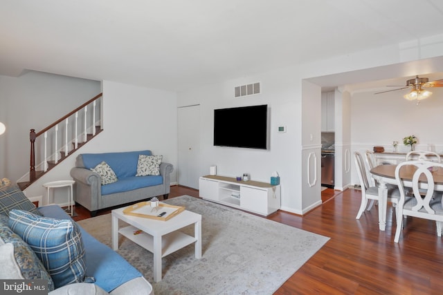 9060 Moonshine Holw Unit G, Laurel, MD 20723 - living area featuring dark wood-style flooring, stairway, and a ceiling fan