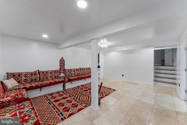 tiled living area featuring recessed lighting and stairway