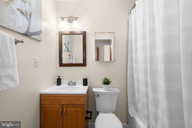 full bath featuring toilet and vanity