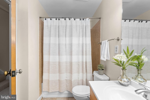 bathroom with shower / bath combo, toilet, and vanity