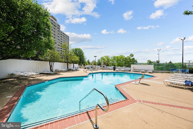 6101 Edsall Rd Unit 1408, Alexandria, VA 22304 - pool featuring a patio and fence