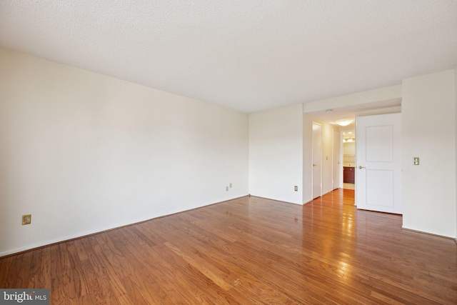6101 Edsall Rd Unit 1408, Alexandria, VA 22304 - empty room featuring wood finished floors