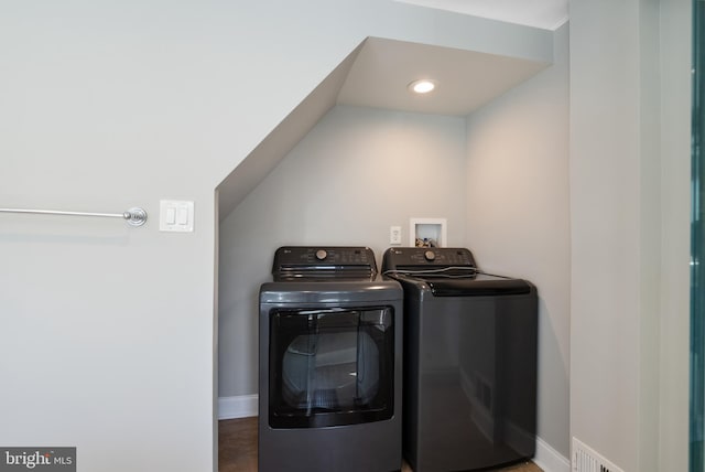 laundry area featuring laundry area, separate washer and dryer, baseboards, and recessed lighting
