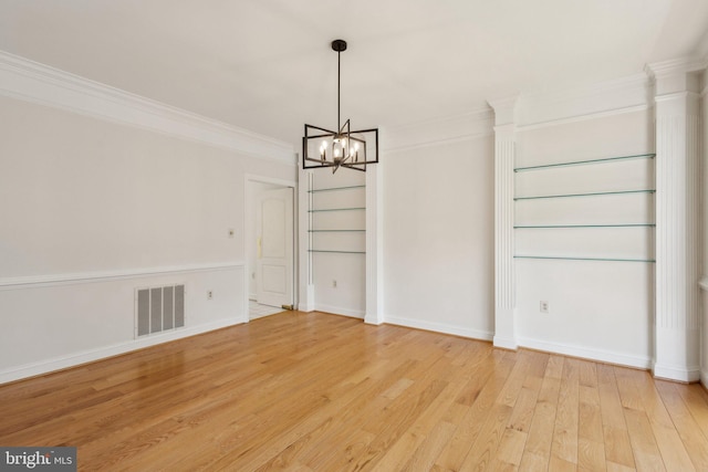 9313 Braymore Cir, Fairfax Station, VA 22039 - unfurnished dining area featuring crown molding, a chandelier, light wood-style flooring, baseboards, and visible vents