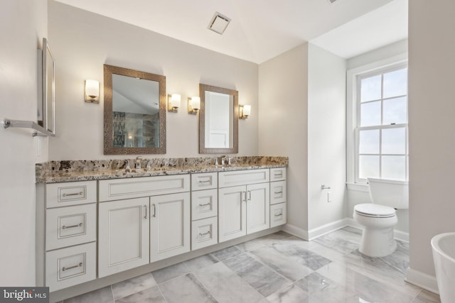 9313 Braymore Cir, Fairfax Station, VA 22039 - bathroom with marble finish floor, baseboards, a sink, and a shower