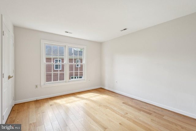 9313 Braymore Cir, Fairfax Station, VA 22039 - spare room with wood-type flooring, baseboards, and visible vents