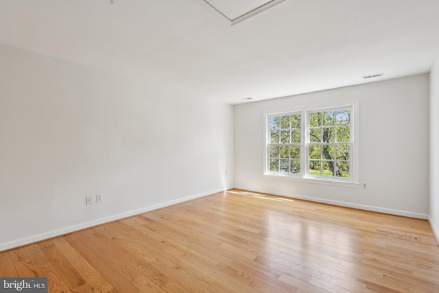 9313 Braymore Cir, Fairfax Station, VA 22039 - unfurnished room featuring baseboards, wood finished floors, and visible vents
