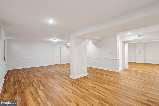 9313 Braymore Cir, Fairfax Station, VA 22039 - finished below grade area featuring recessed lighting, light wood-style floors, visible vents, and baseboards