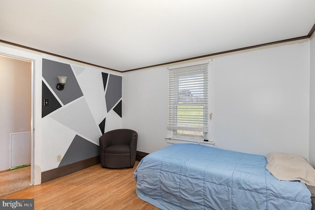 bedroom featuring light wood-type flooring