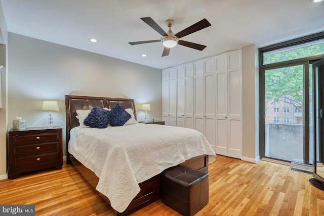 1273 Delaware Ave SW Unit 66, Washington, DC 20024 - bedroom featuring light wood-type flooring, access to outside, recessed lighting, baseboards, and ceiling fan