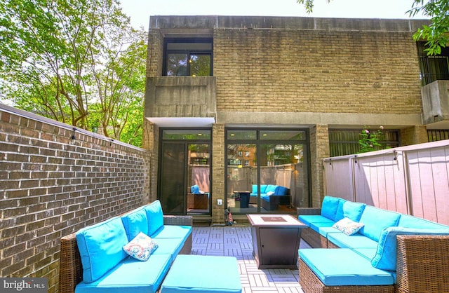 1273 Delaware Ave SW Unit 66, Washington, DC 20024 - wooden terrace with an outdoor living space with a fire pit and a patio