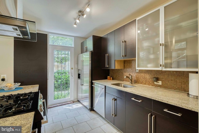 1273 Delaware Ave SW Unit 66, Washington, DC 20024 - kitchen with white dishwasher, a sink, stainless steel refrigerator with ice dispenser, backsplash, and extractor fan