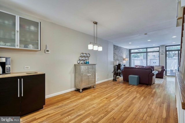 1273 Delaware Ave SW Unit 66, Washington, DC 20024 - living area with light wood-style floors and baseboards