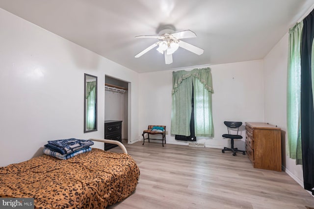 7020 Parsons Ln, Port Norris, NJ 08349 - bedroom with a closet, wood finished floors, baseboards, and ceiling fan
