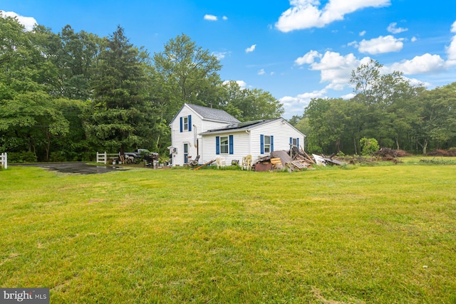 7020 Parsons Ln, Port Norris, NJ 08349 - view of front of home with a front yard, entry steps, and a view of trees