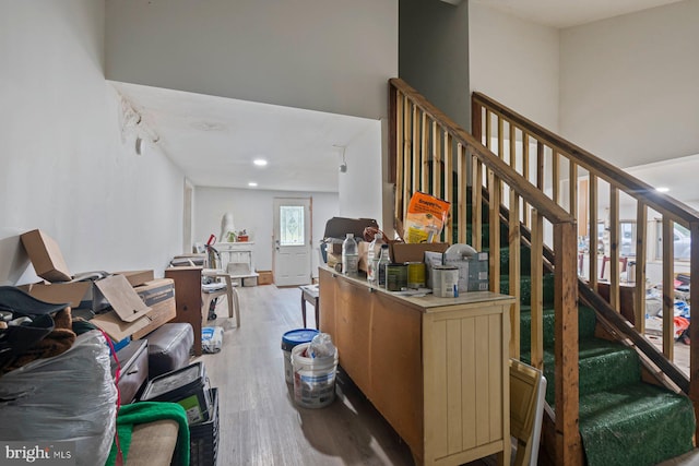 7020 Parsons Ln, Port Norris, NJ 08349 - living area with wood finished floors, recessed lighting, and stairway