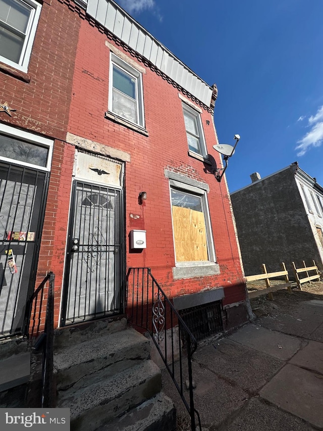 1321 W Rush St, Philadelphia, PA 19132 - view of exterior entry with brick siding