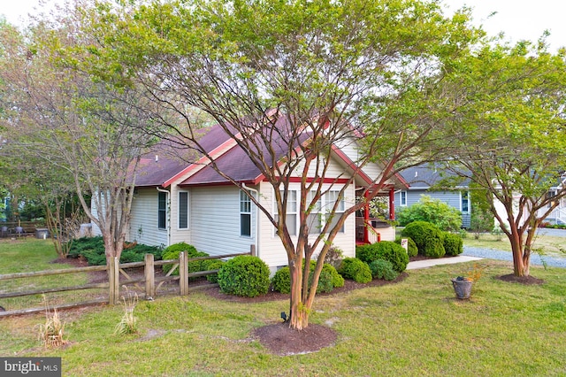 24 Assawoman Ave, Ocean View, DE 19970 - view of front of property featuring fence and a front yard