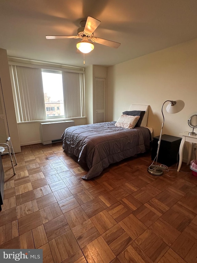 bedroom featuring ceiling fan