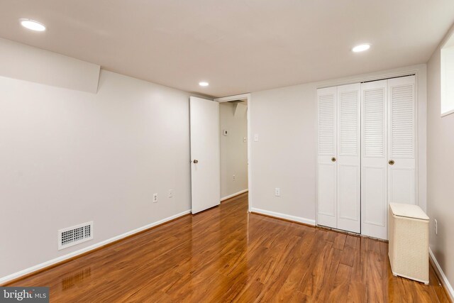 5310 Orchardson Ct, Fairfax, VA 22032 - unfurnished bedroom featuring wood finished floors, recessed lighting, baseboards, and a closet