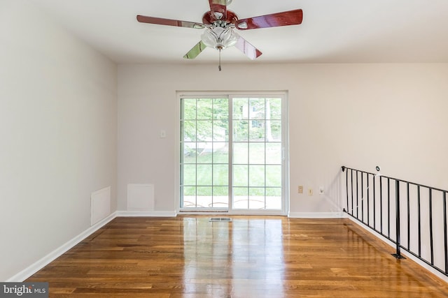 5310 Orchardson Ct, Fairfax, VA 22032 - spare room with wood finished floors, ceiling fan, and baseboards