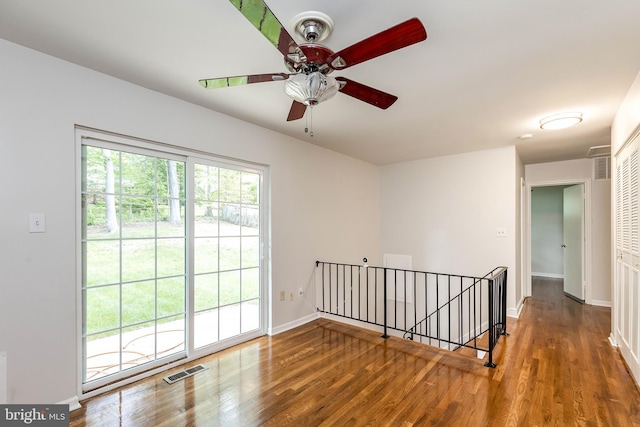 5310 Orchardson Ct, Fairfax, VA 22032 - spare room featuring ceiling fan, wood finished floors, and baseboards
