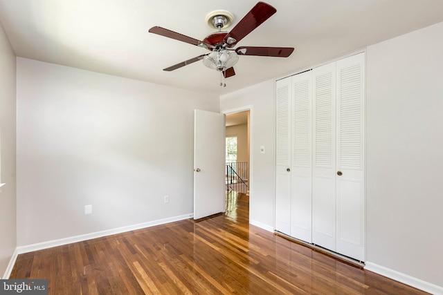 5310 Orchardson Ct, Fairfax, VA 22032 - unfurnished bedroom featuring wood finished floors, a closet, baseboards, and ceiling fan