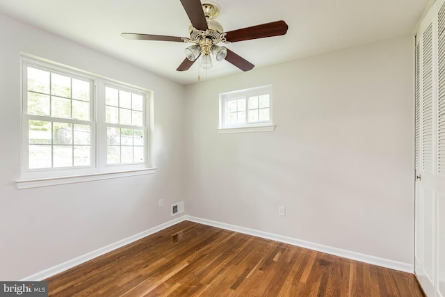 5310 Orchardson Ct, Fairfax, VA 22032 - unfurnished bedroom featuring a closet, baseboards, dark wood-type flooring, and ceiling fan