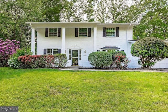 5310 Orchardson Ct, Fairfax, VA 22032 - neoclassical / greek revival house featuring a front lawn and brick siding