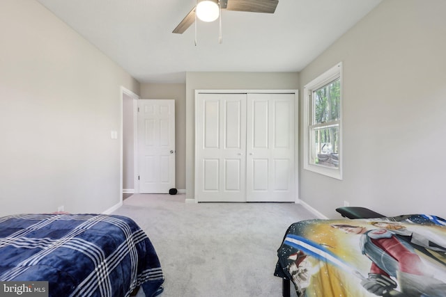 7303 Westwind Ct, Bowie, MD 20715 - bedroom featuring baseboards, a ceiling fan, a closet, and carpet flooring