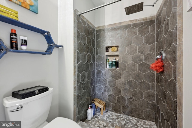 7303 Westwind Ct, Bowie, MD 20715 - bathroom featuring toilet and a tile shower