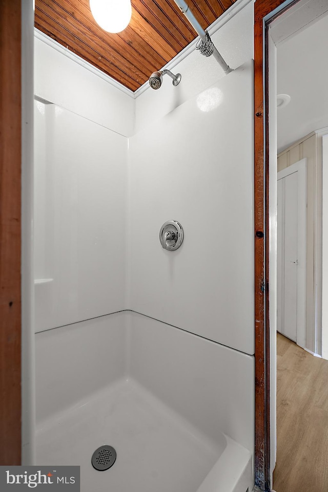 10 34th St, Ocean City, MD 21842 - bathroom featuring a shower, wood finished floors, and wooden ceiling