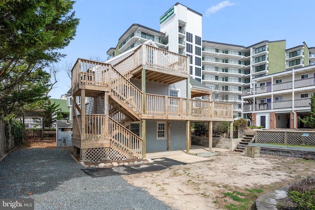 10 34th St, Ocean City, MD 21842 - back of house with a deck, a patio area, fence, and stairs