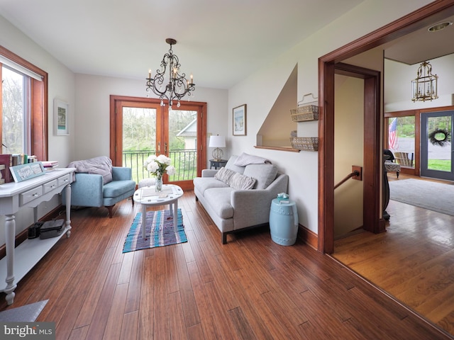 110 Clay Ridge Rd, Ottsville, PA 18942 - living room featuring a chandelier, plenty of natural light, and dark wood-style floors
