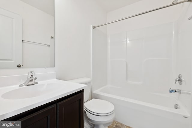 bathroom featuring toilet, shower / tub combination, and vanity
