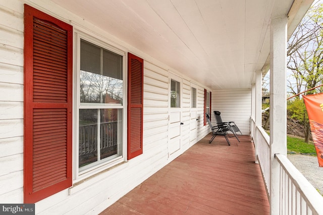 wooden terrace with covered porch