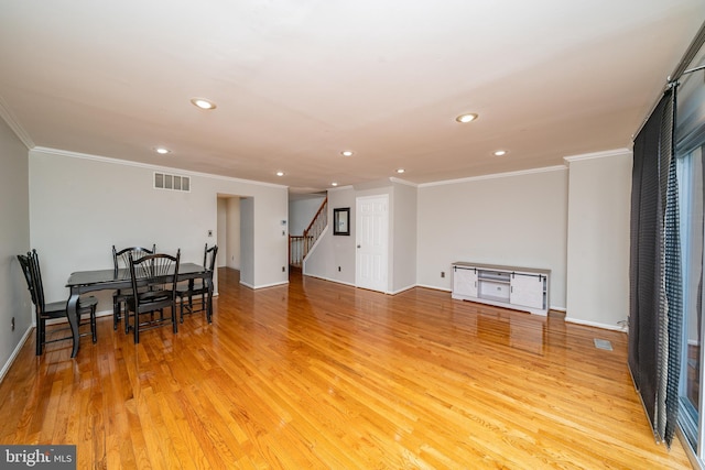 living room with crown molding, stairway, recessed lighting, and visible vents