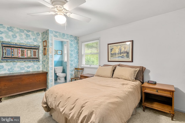 552 Brookwood Rd, Wayne, PA 19087 - bedroom with wallpapered walls, carpet, connected bathroom, and a ceiling fan