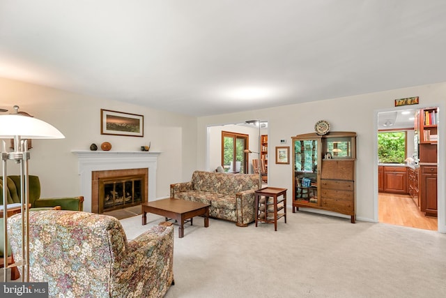 552 Brookwood Rd, Wayne, PA 19087 - living area featuring plenty of natural light, light carpet, and a brick fireplace