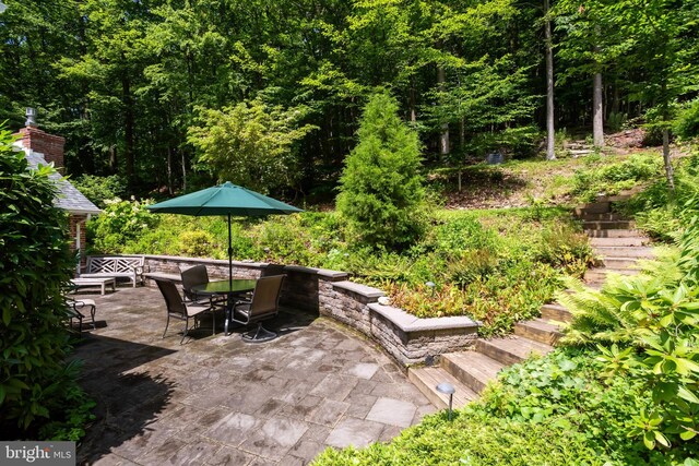 552 Brookwood Rd, Wayne, PA 19087 - view of patio featuring outdoor dining space and stairs
