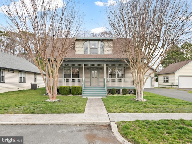 37599 Bluemont Turn, Frankford, DE 19945 - bungalow-style house with a porch, a shingled roof, central air condition unit, and a front yard