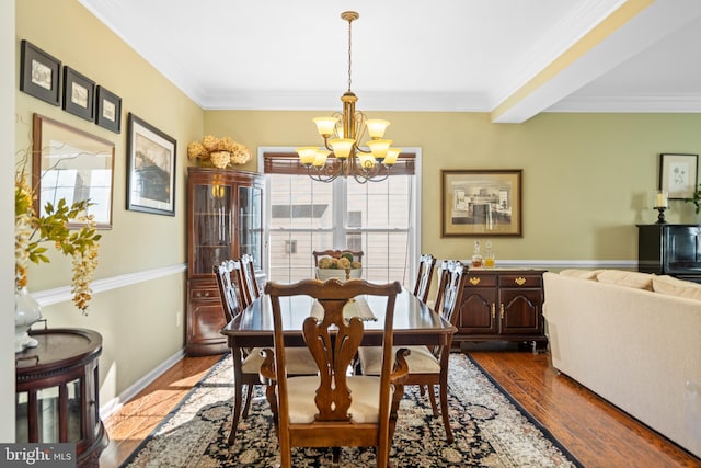 109 Aulee Ct, Winchester, VA 22602 - dining area featuring a chandelier, crown molding, and dark wood-style floors